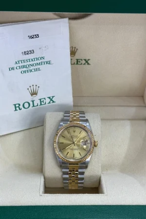 Rolex Datejust 36 | Lunette cannelée en or jaune 18 carats | Champagne/Jubilee | 16233 |