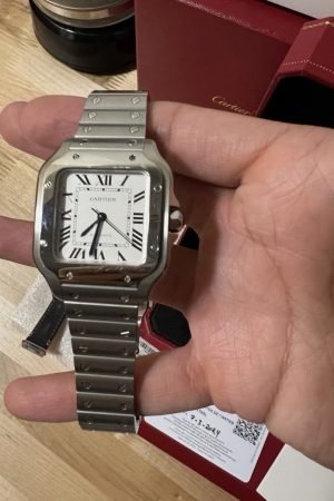 Montre automatique Cartier Santos Medium, cadran blanc, WSSA0029, état neuf.