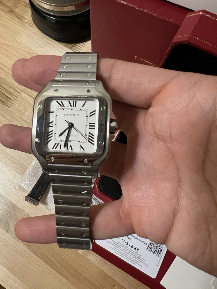 Montre automatique Cartier Santos Medium, cadran blanc, WSSA0029, état neuf.