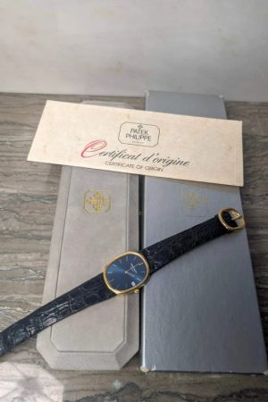 Montre Patek Philippe Ellipse Or 3788 Cadran Bleu Coffret Complet Or Jaune